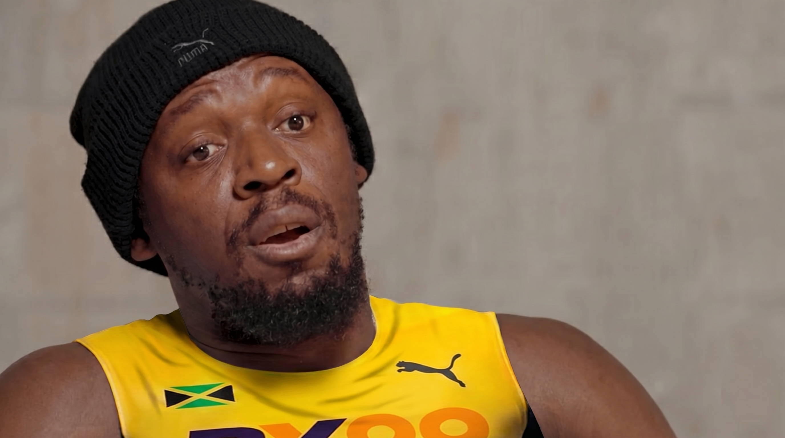 Close-up of BX99 26/27 Global Brand Ambassador Usain Bolt looking focused during an exclusive behind-the-scenes interview