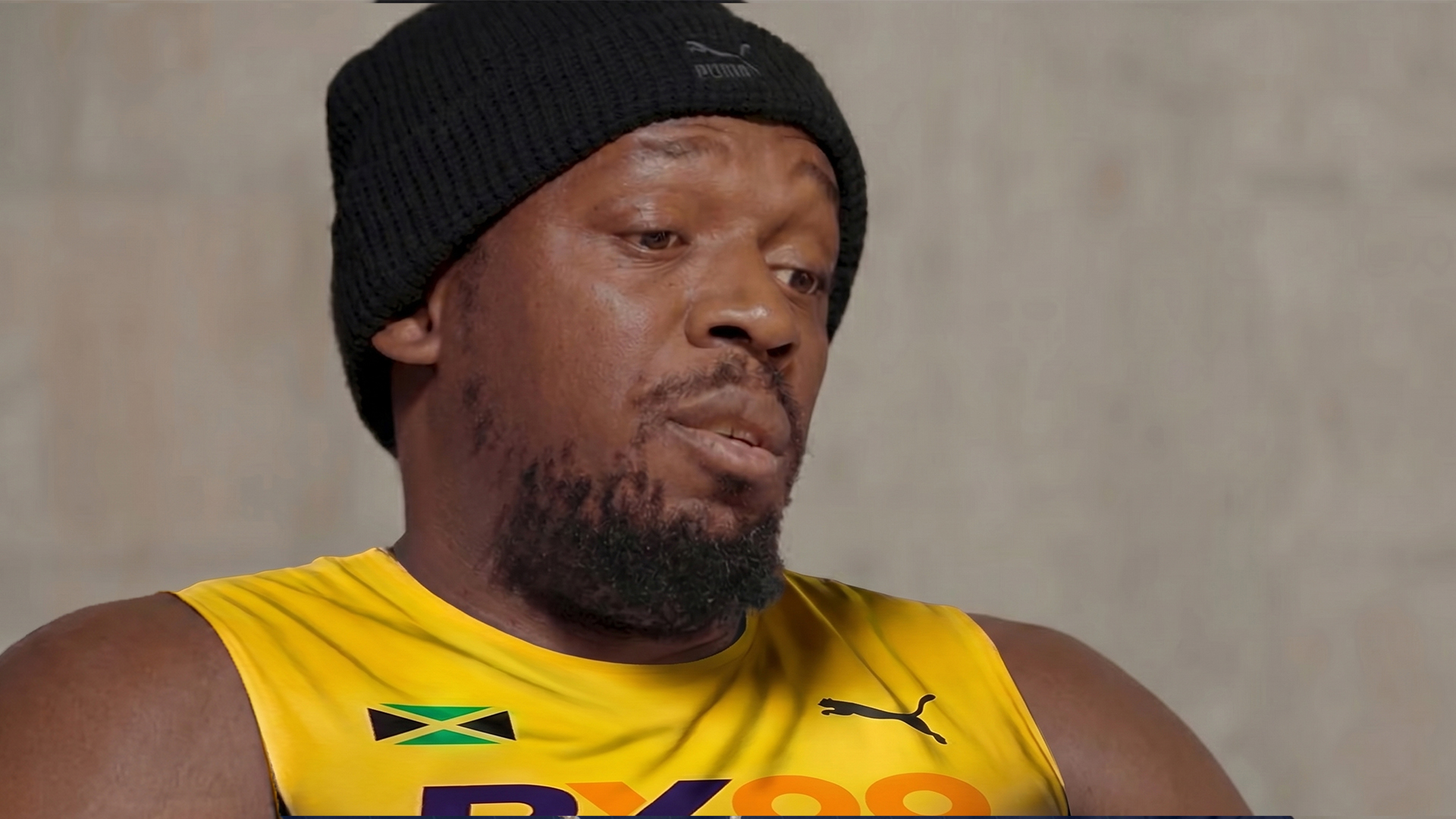 BX99 26/27 Global Brand Ambassador Usain Bolt signing an official yellow jersey during an exclusive behind-the-scenes shoot